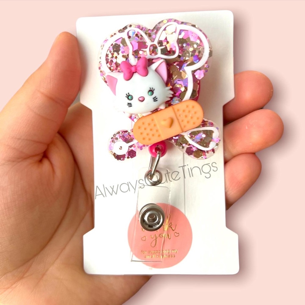 Aristo cat Disney glitter medical badge
